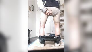 full diaper adding more piss